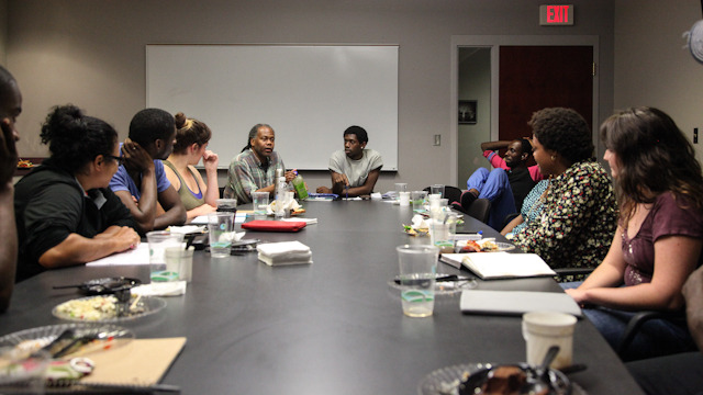 Reggie Wilson talks with Fist and Heel performers and FSU student cohort members