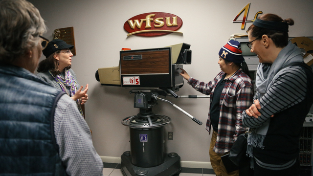 Suzanne Smith taking Jennifer Monson and collaborators on a production studio tour of WFSU TV