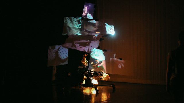 Staycee Pearl performing with video installation sculpture