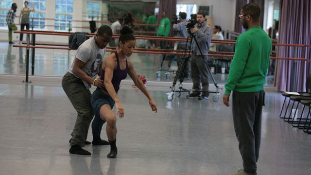 Maleek Washington and Rena Butler rehearse a duet as Abraham offers notes