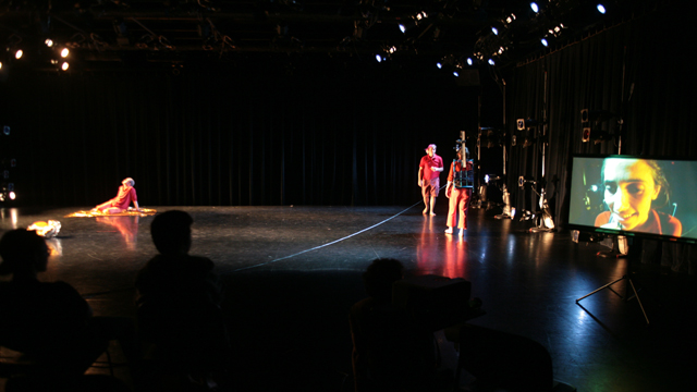 A full-stage shot of the dialogue duet